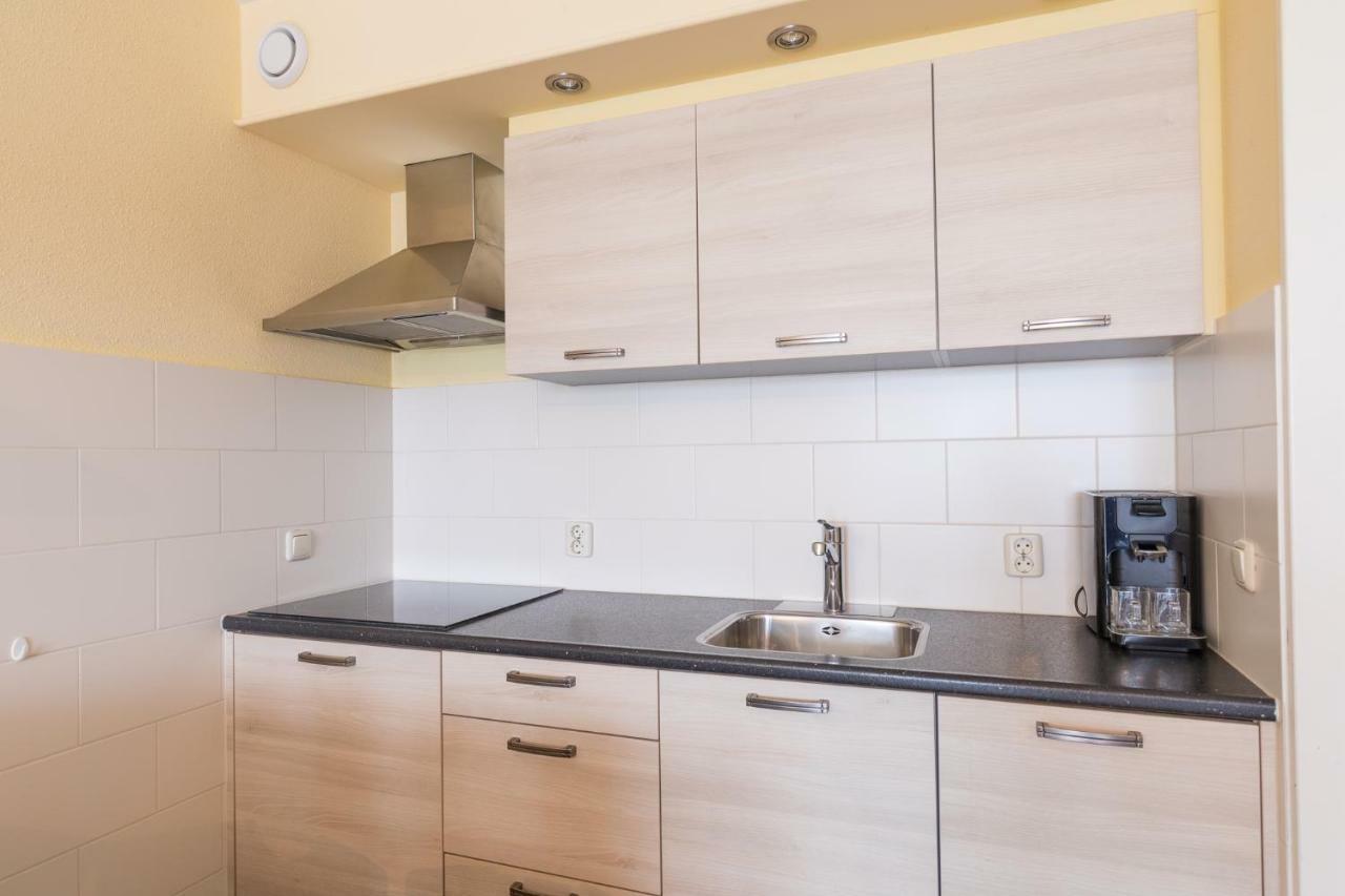 Appartement De Vrijbuiter, Resort Amelander Kaap 홀륌 외부 사진