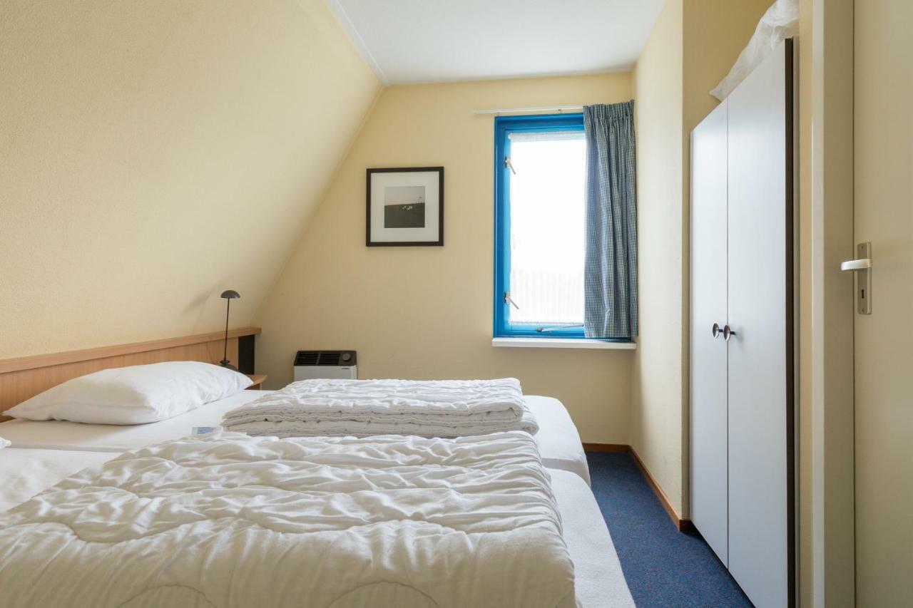 Appartement De Vrijbuiter, Resort Amelander Kaap 홀륌 외부 사진